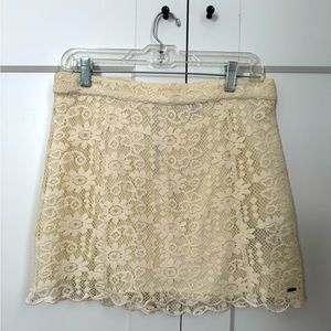 Volcom white lace mini skirt